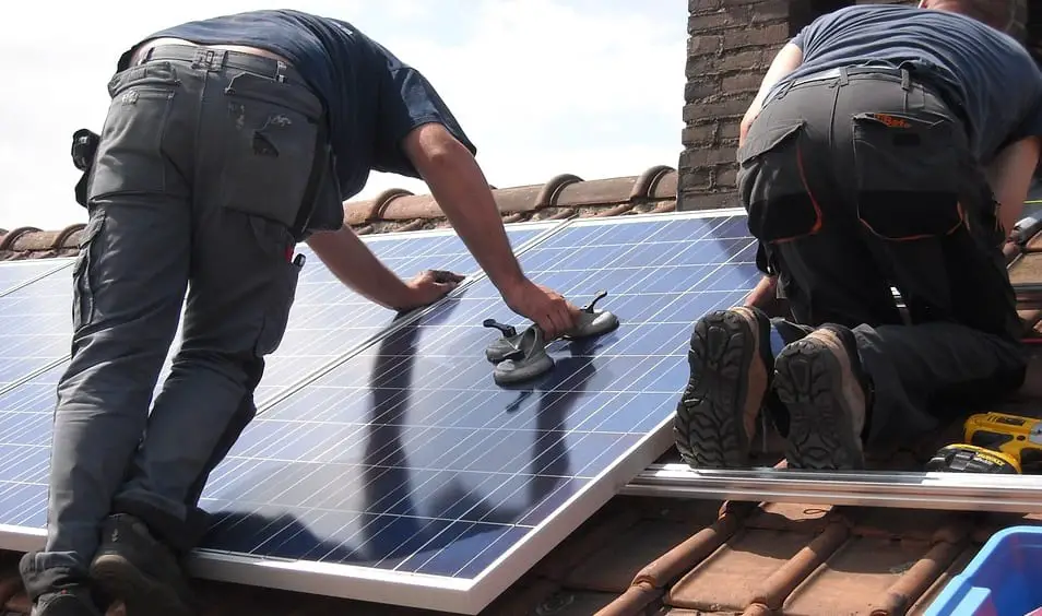 solar enegy law - solar panels being installed on roof
